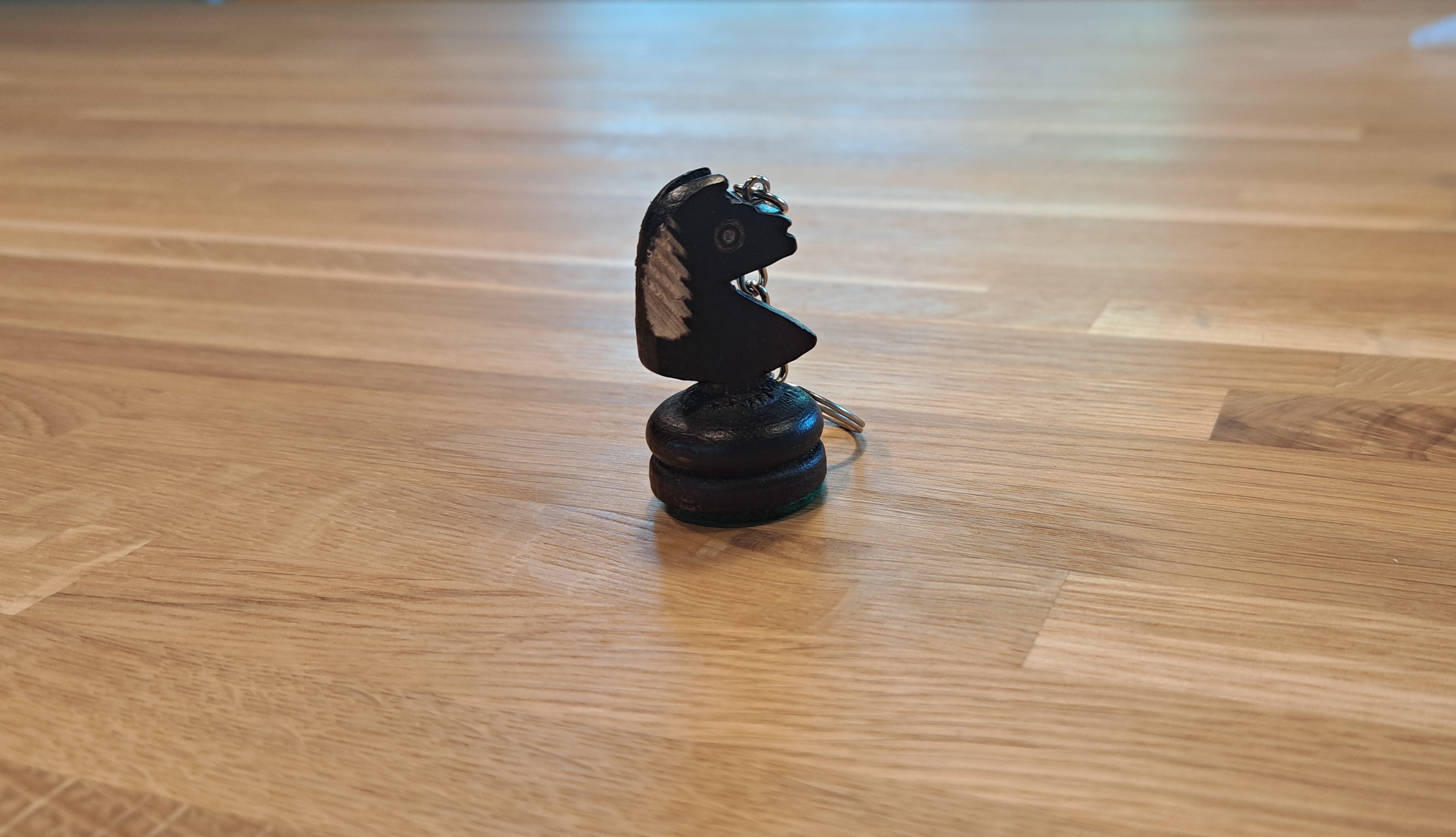 Schwarzer Jumper-Schlüsselanhänger - 93a15723ed40ef4431a775232d95aade